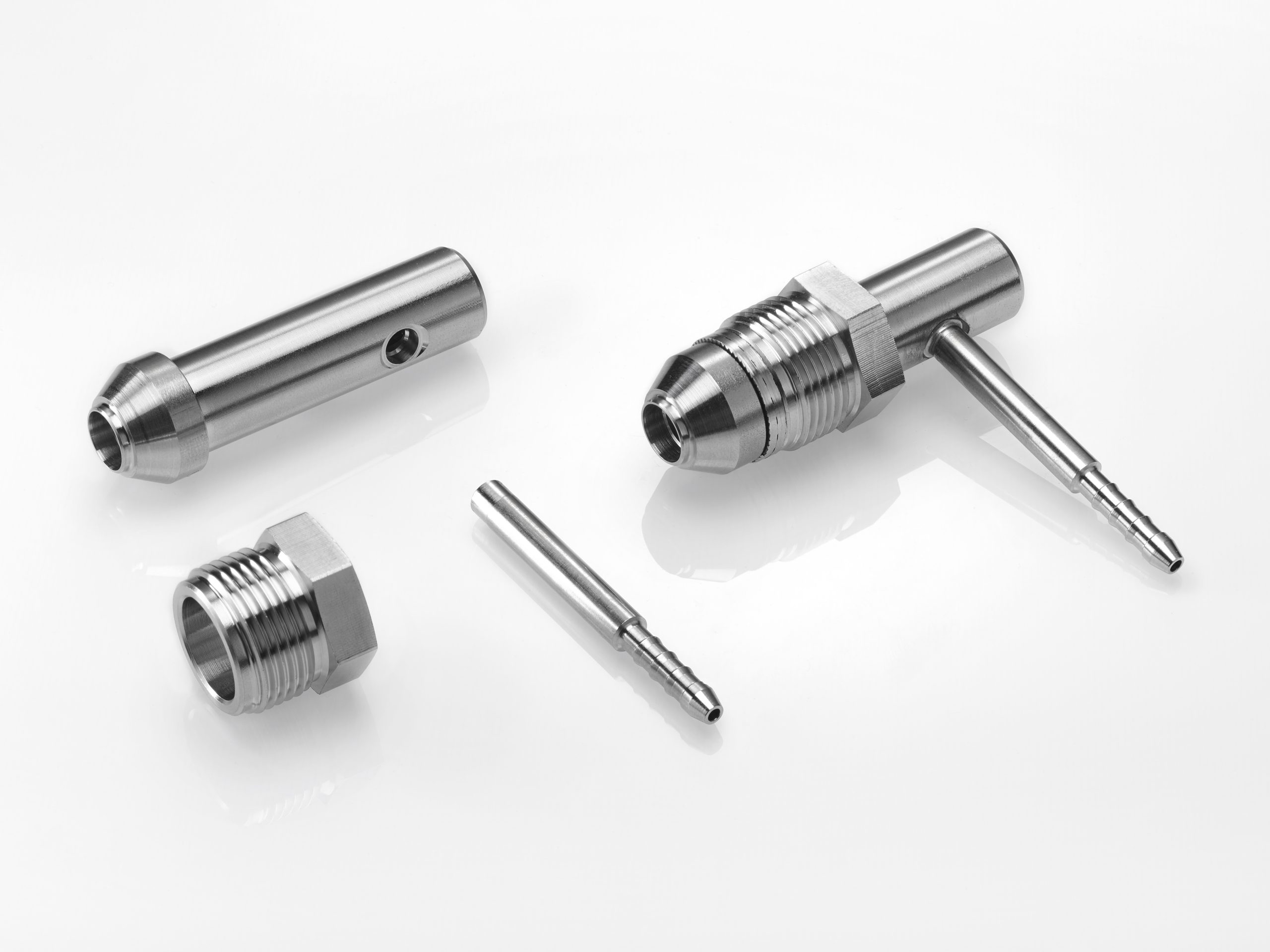 Engine emissions control sub-assembly